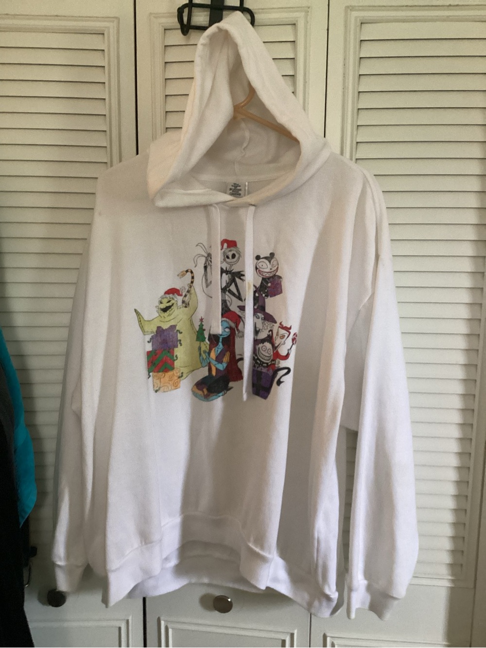White Graphic Hoodie with Festive Cartoon Characters
